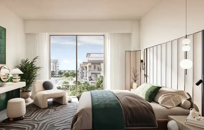 Contemporary bedroom interior at Valia, Dubai Creek Harbour, with floor-to-ceiling windows onto landscaped grounds